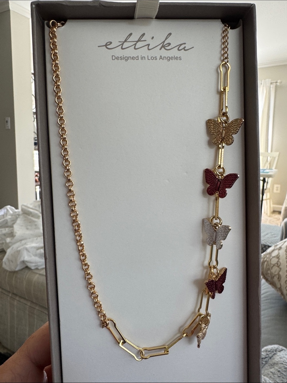 Gold Butterfly Pendant Necklace with Red and Silver Accents
